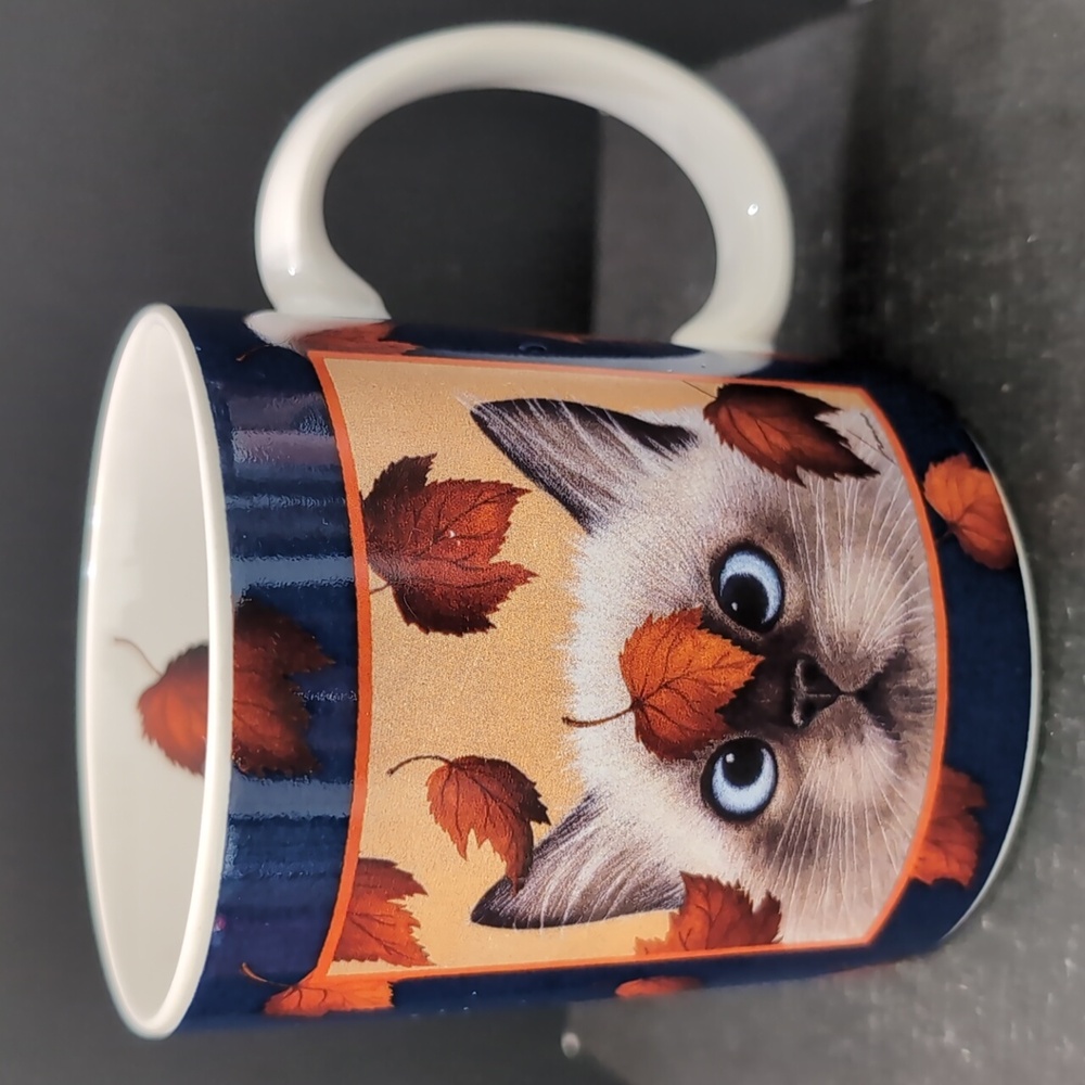 Lang And Wise,Erin Martin By Lowell Herrero 1996 Blue/White Catching Leaves Mug.